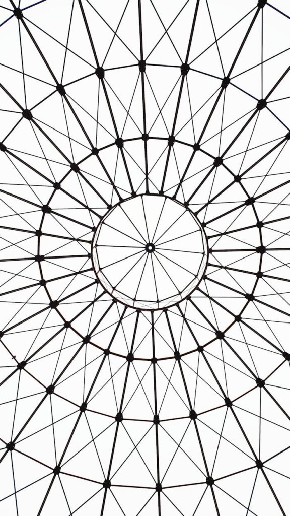 Artistic geometric dome ceiling with intricate lines and patterns in Leipzig, Germany.
